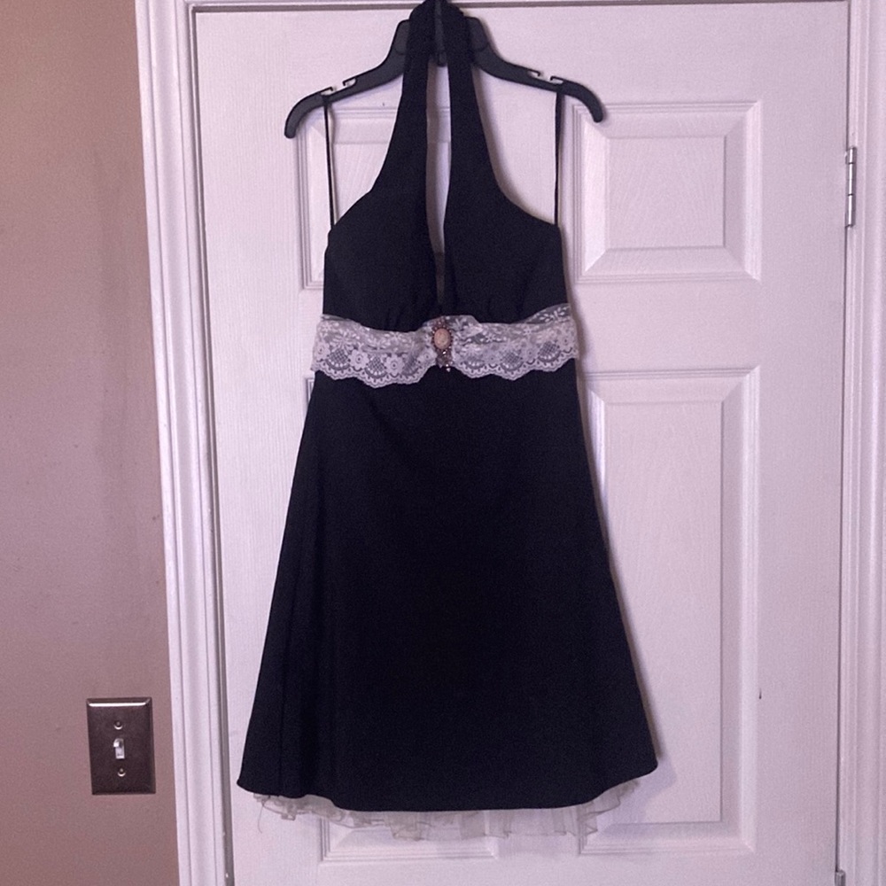 Adorable black dress with brioche